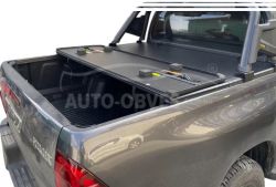 Крышка в кузов Toyota Hilux 2015-2020 - тип: 4-х секционная фото 0