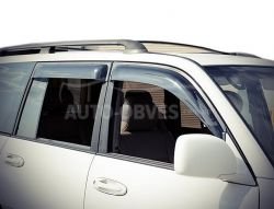 Дефлекторы на окна ветровики Toyota Land Cruiser 100 - тип: широкие фото 0