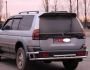 Захист заднього бампера Mitsubishi Pajero Sport 1997-2008 - тип: на стійках фото 3