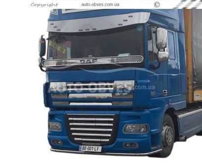 Накладки на решітку радіатора верхню DAF XF - на капоті фото 14