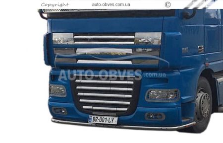 Накладки на решітку радіатора верхню DAF XF - на капоті фото 15