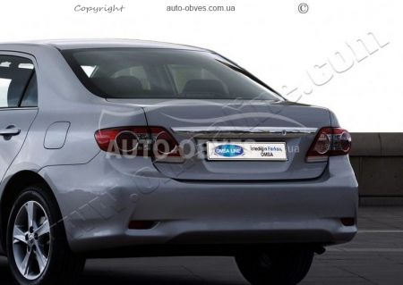 Накладка над номер на крышку багажника Toyota Corolla 2010-2012 фото 2