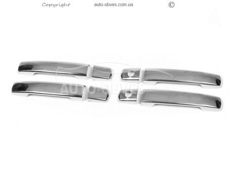 Накладки на дверні ручки Nissan Navara - тип: 2-а отвори фото 0