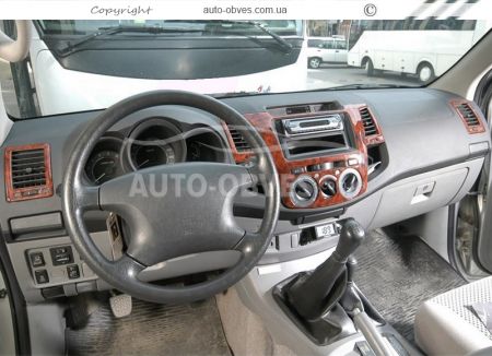 Декор на панель Toyota Hilux 2006-2011 - тип: наклейки фото 1