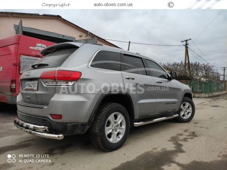 Защита заднего бампера Jeep Grand Cherokee 2014-2019 - тип: модельная, с пластинами фото 1