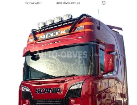 Держатель под фары Scania - тип: крашеный в черный цвет фото 0